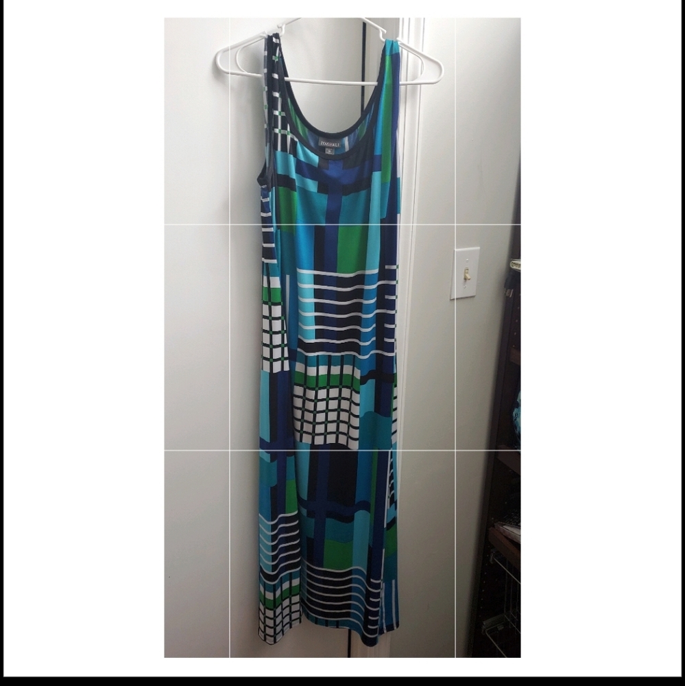 Plus size long sleeveless dress.